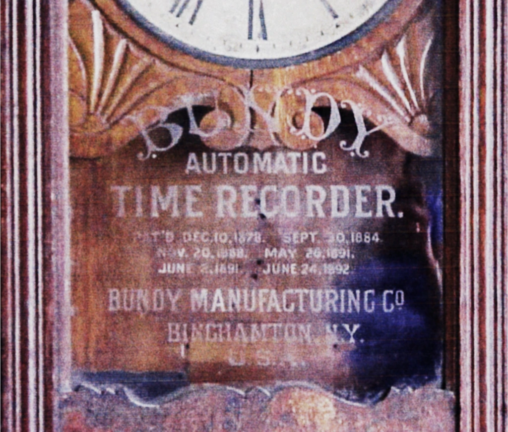 Very early Bundy time recorder glass front